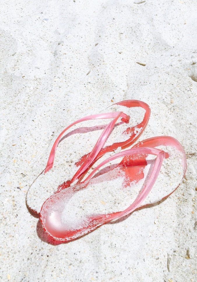 Pink Jelly Flipflops in the sand